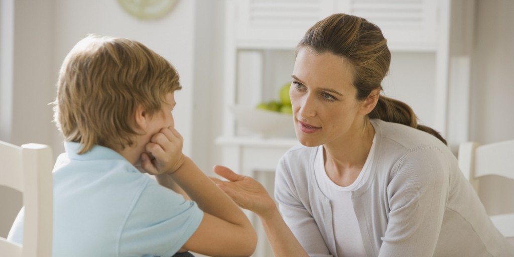 Mother having discussion with son